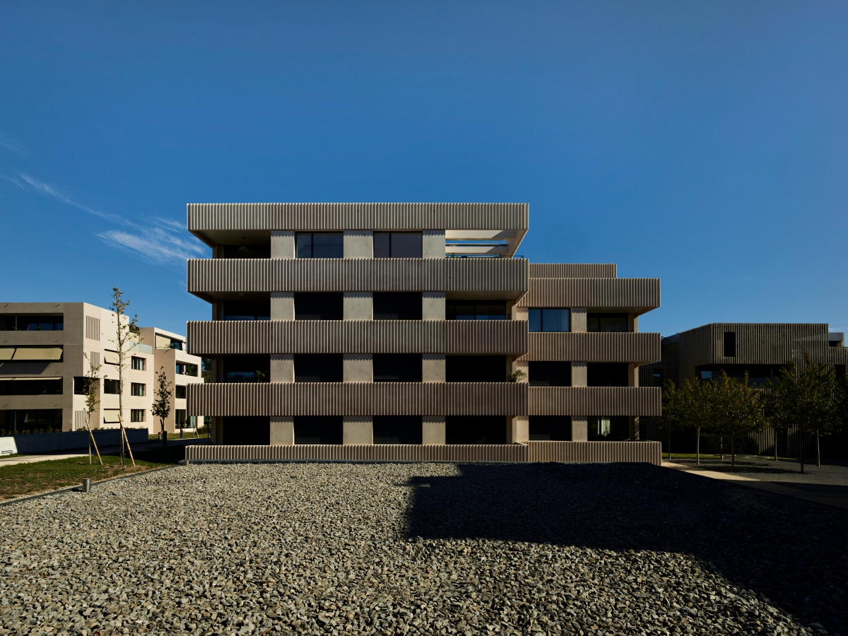 Vue extérieure d'un bâtiment Big Field Housing au sein du nouveau quartier FdMP architectes